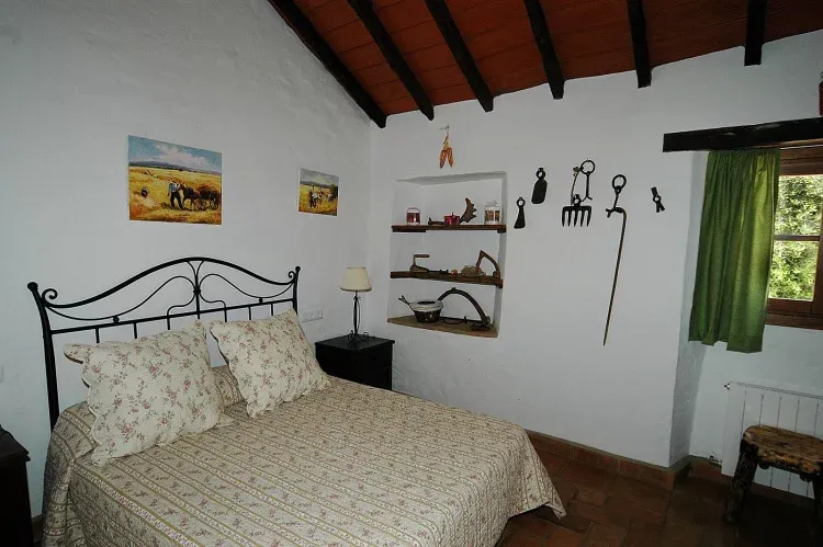 Imagen de dormitorio de matrimonio delcortijo