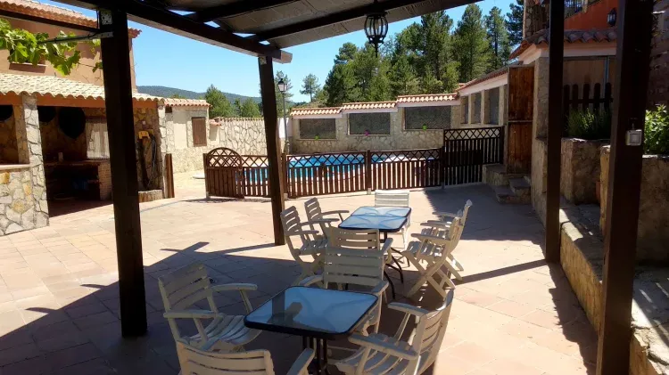 Imagen de la terraza Junto a la piscina