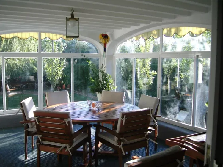 Imagen de porche al jardin