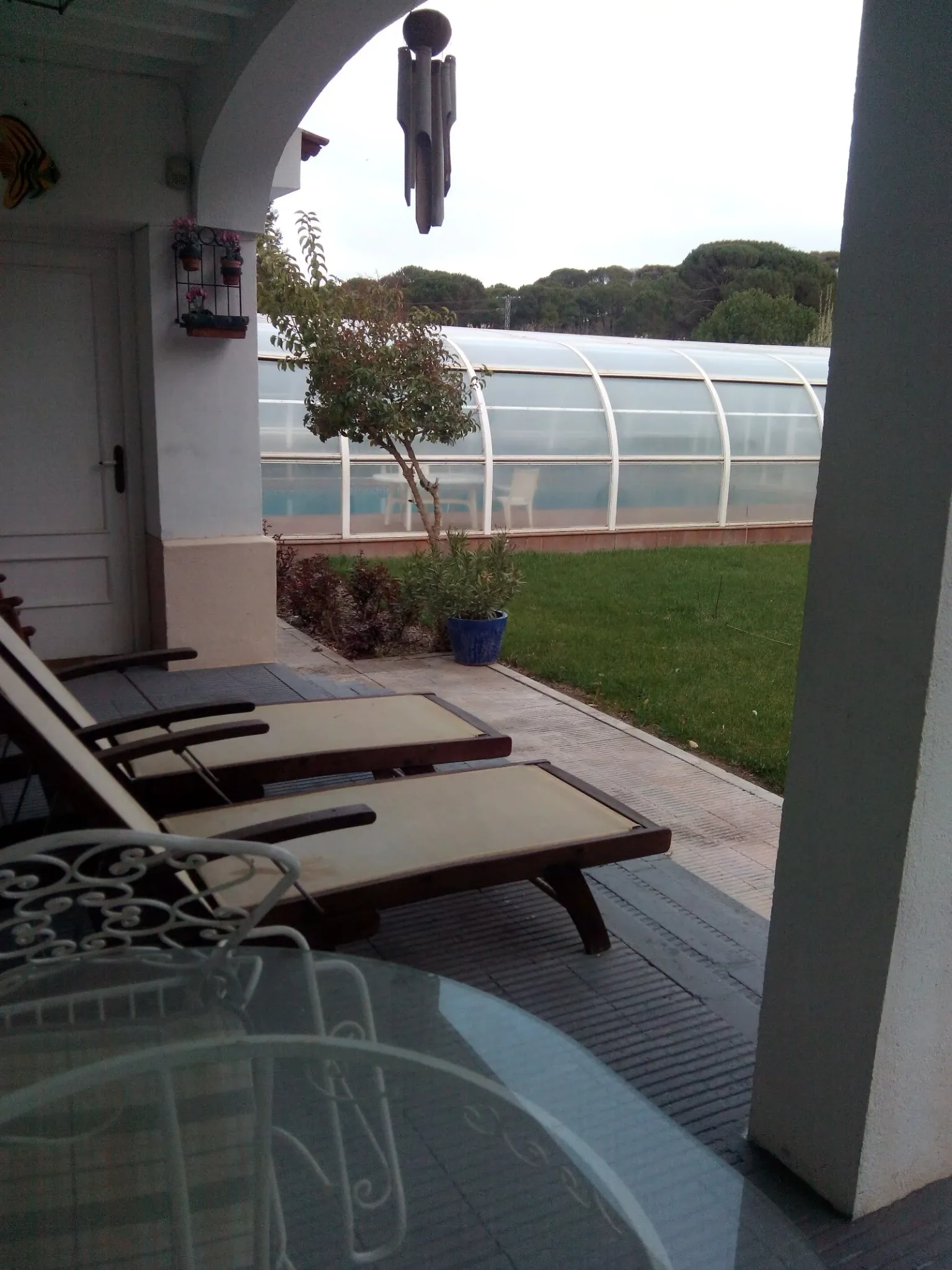 Imagen de porche al jardin