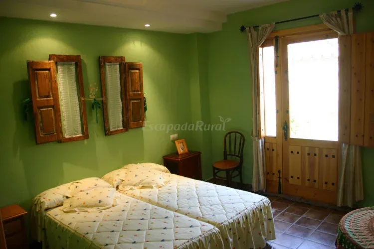Imagen de Habitación de la suite rural "La Cocina". Alojamientos Rurales La Aldaba-Navalagamella