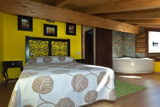 Imagen de El Estribo - Habitación abuhardillada con jacuzzi