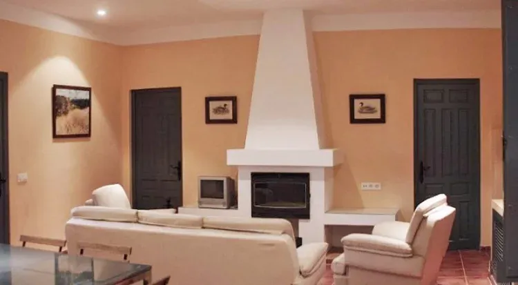 Imagen de Salón con chimenea