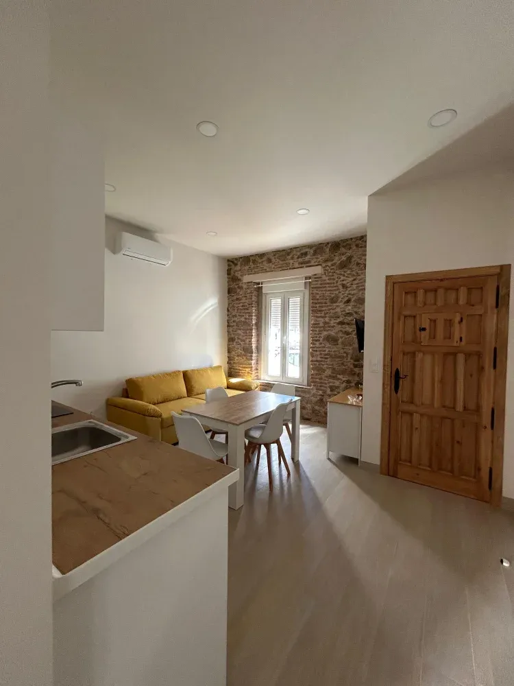 Imagen de Sala de estar con cocina integrada 