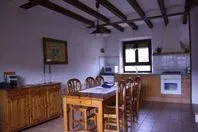 Imagen de Comedor,  cocina y chimenea