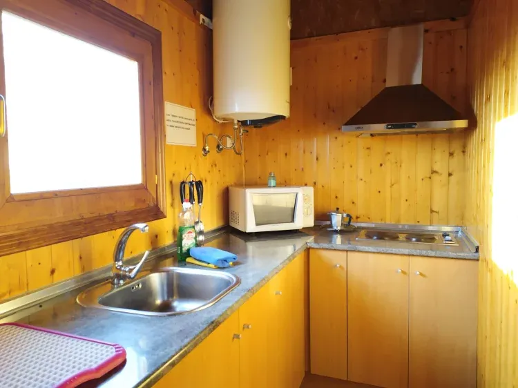 Imagen de Cocina y casa de madera
