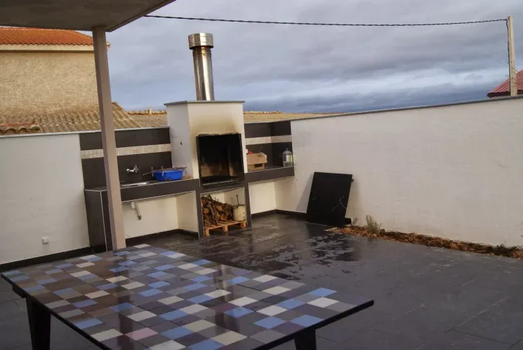 Imagen de Barbacoa desde el porche