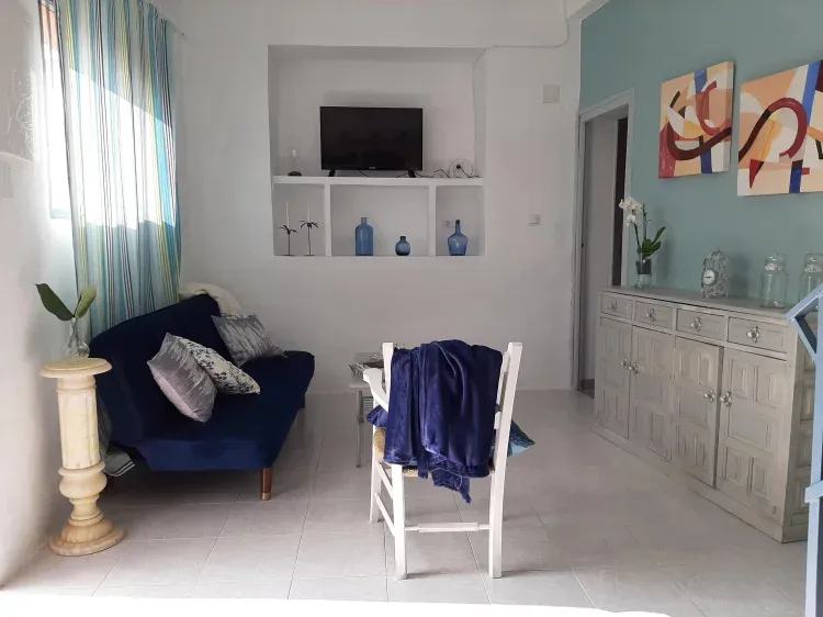 Imagen de Casa rural eccehomo de borja Salón comedor con chimenea