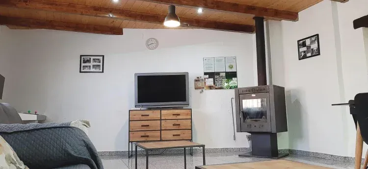 Imagen de Salón-estufa de leña