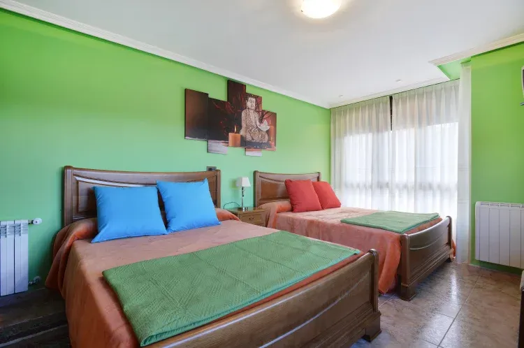 Imagen de Dormitorio con dos camas de 1,50
