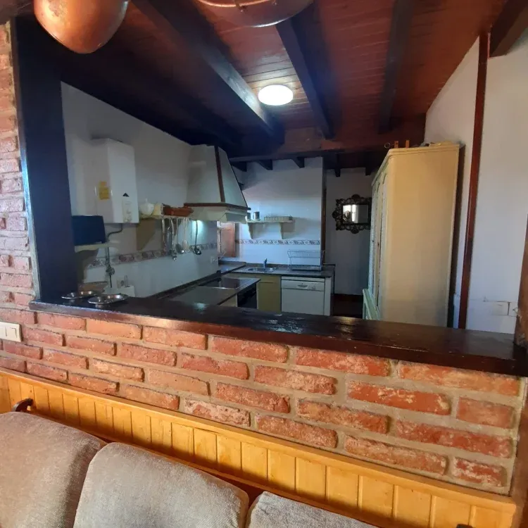 Imagen de Zona cocina abierta a comedor
