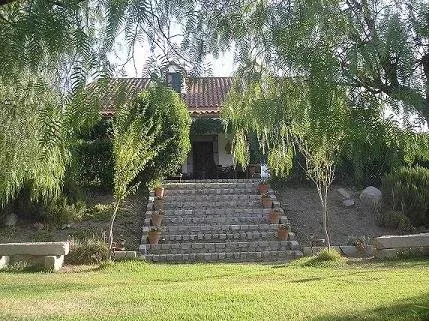 Imagen de porche desde jardin