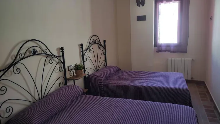 Imagen de Habitación dos camas casa arco