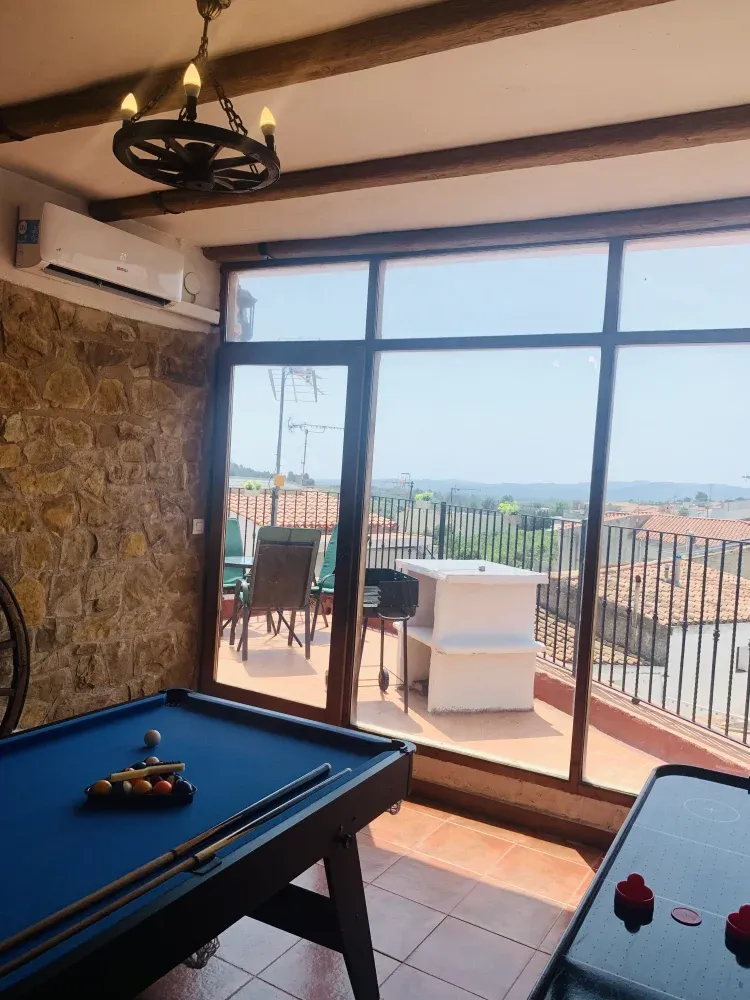 Imagen de Terraza y sala de juegos con aire acondicionado