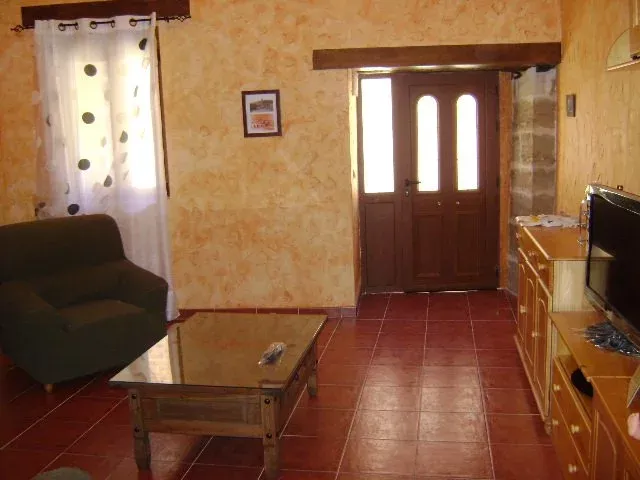 Imagen de sala de estar junto merendero
