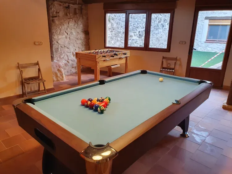 Imagen de Sala multiusos con billar, futbolín y barbacoa.