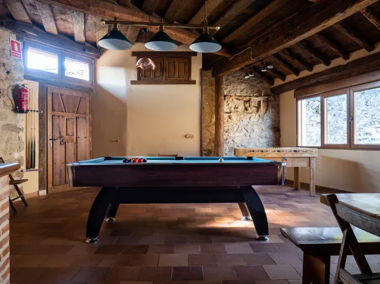 Imagen de Sala multiusos con billar, futbolín y barbacoa.