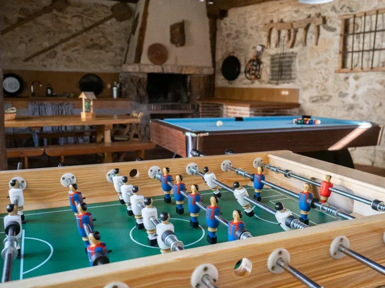 Imagen de Sala multiusos con billar, futbolín y barbacoa.