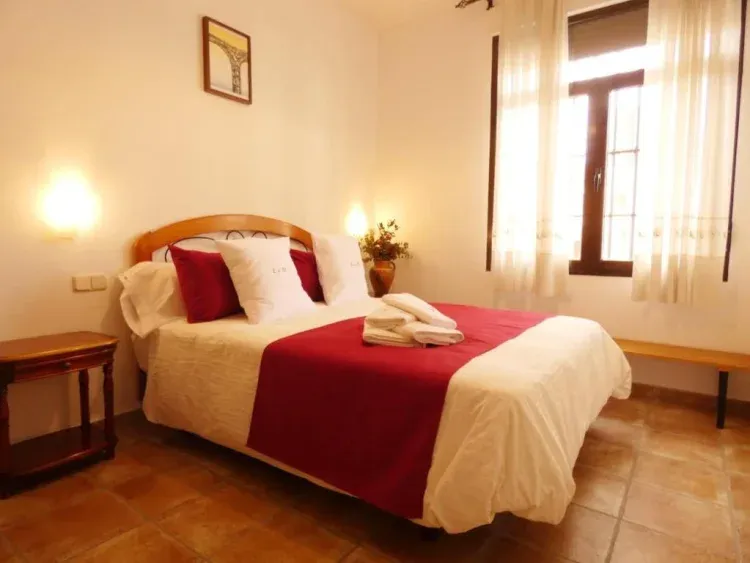 Imagen de DOMITORIO CON CAMA 1,50