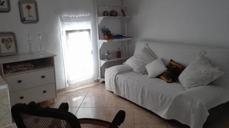 Imagen de Sala con sofá cama