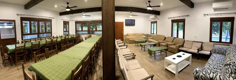 Imagen de Zona de sofás en el salón Casa rural El Batán.